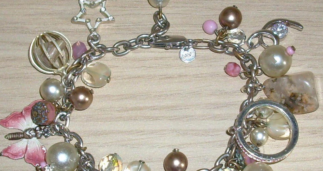 Hand made silvertone & pink charm bracelet