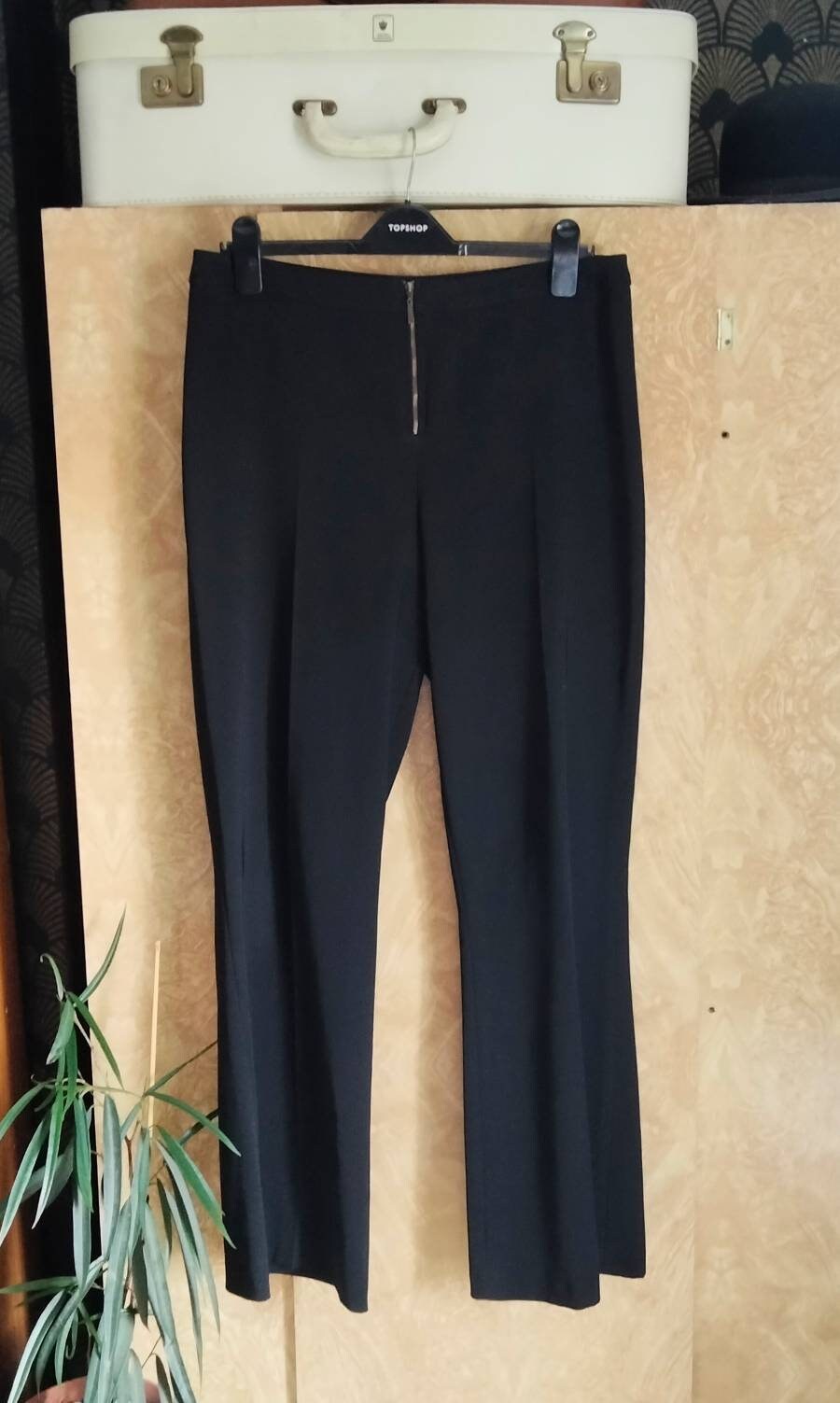 1990s New Look black bootcut zip front trousers 14