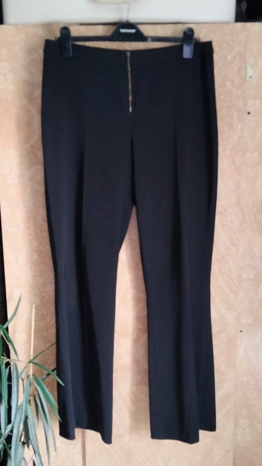 1990s New Look black bootcut zip front trousers 14