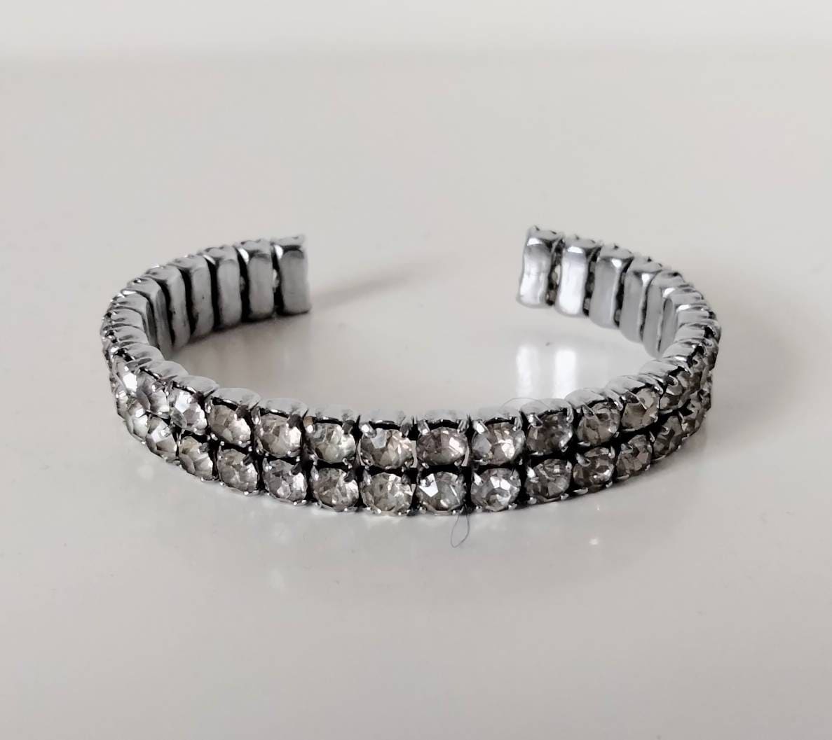 1950s silvertone & clear rhinestone claw set cuff bracelet