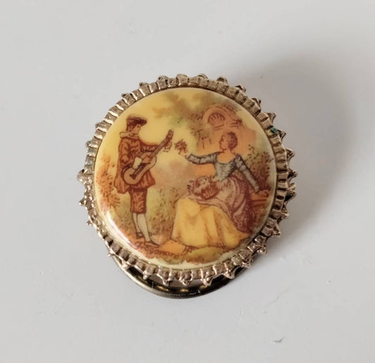 1960s goldtone and ceramic porcelain transfer printed Regency couple scene scarf clip