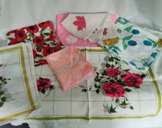 Lot of 9 mid century floral tray cloths, mats & doilies red pink