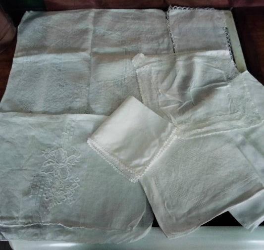Lot of 7 Edwardian white jacquard doilies, cloths & mats