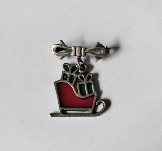 1980s red stained glass Christmas presents on sleigh brooch