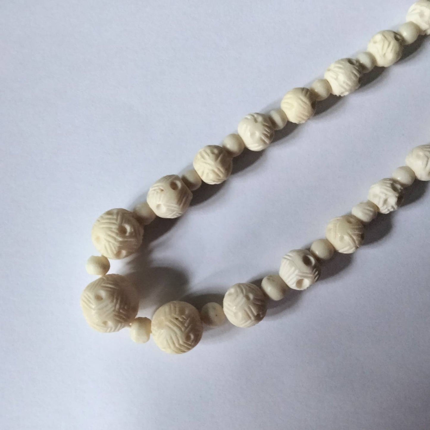 Vintage white hand carved bovine bone graduated bead necklace