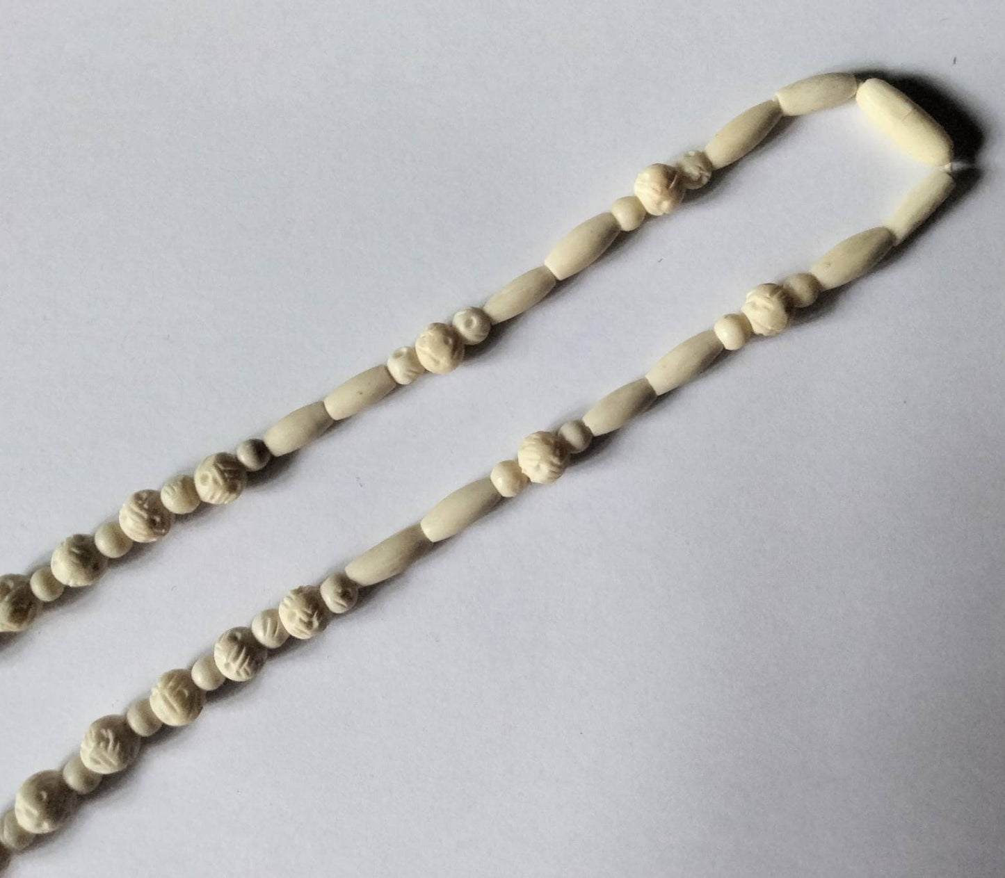 Vintage white hand carved bovine bone graduated bead necklace
