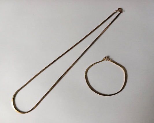 1980s goldtone flat snake chain necklace and bracelet set
