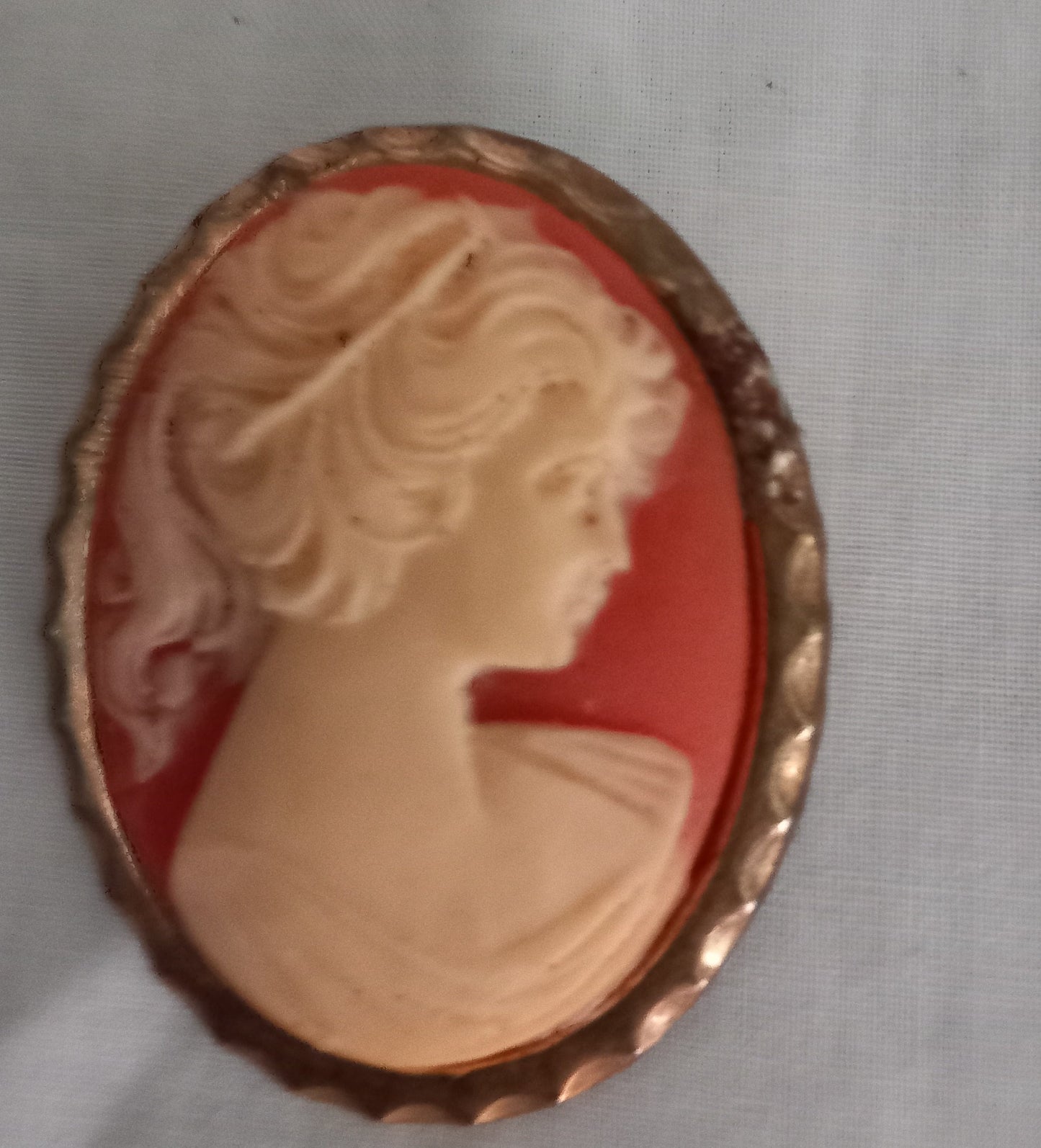 Vintage mid century 1960s Goldtone Faux Cameo Orange & White brooch pin