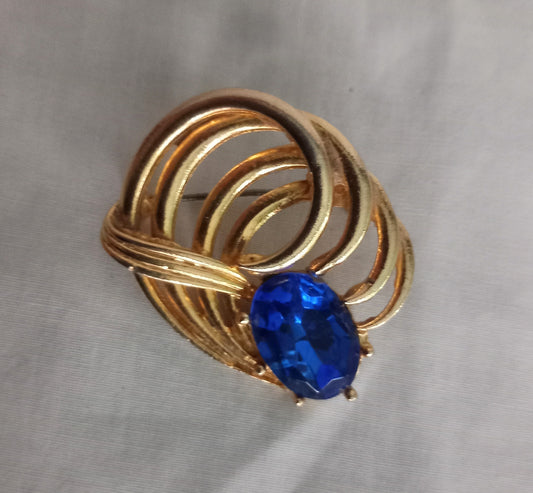 1950s goldtone blue rhinestone curled design brooch pin