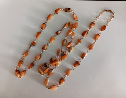 Mid century light brown & white milk glass bead flapper necklace