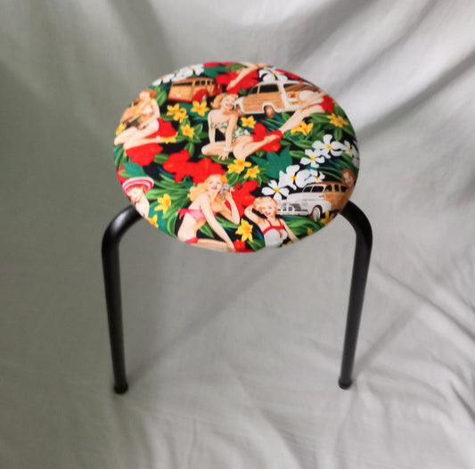 Mid century small stool reupholstered with red Hula Girls pin up girl fabric