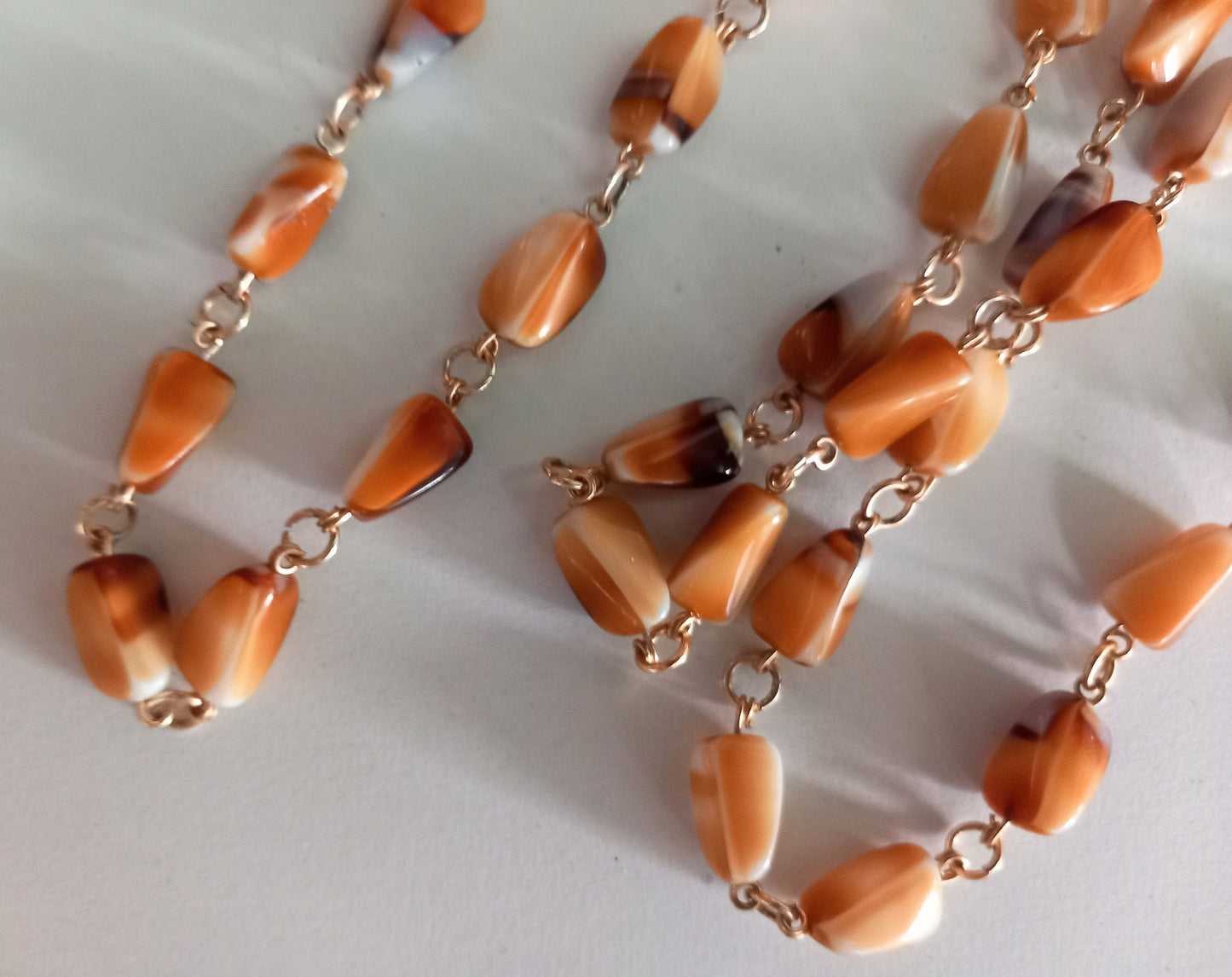 Mid century light brown & white milk glass bead flapper necklace