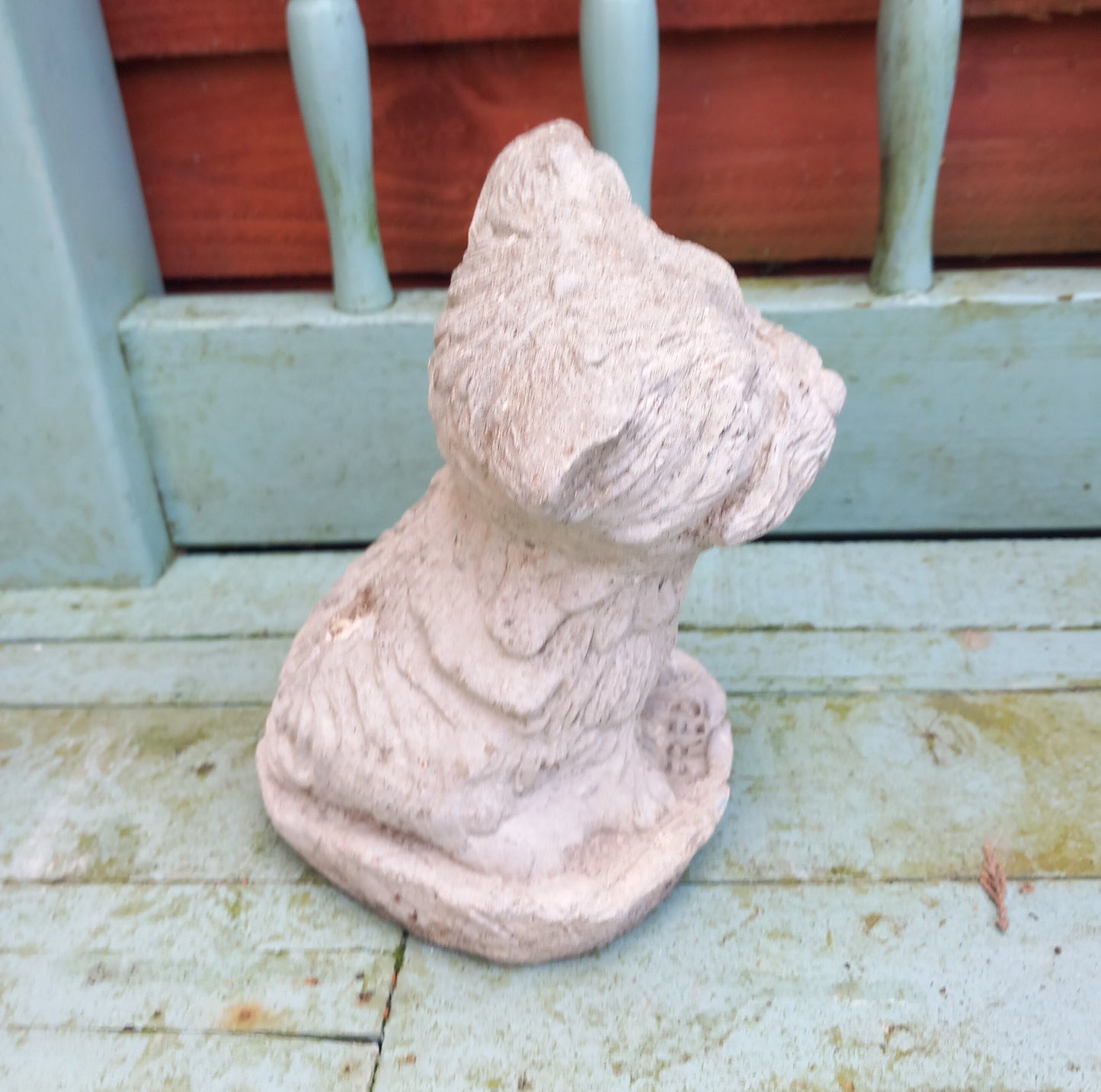Vintage concrete garden statue of a terrier dog