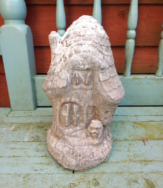 Vintage concrete garden statue of a Mushroom House