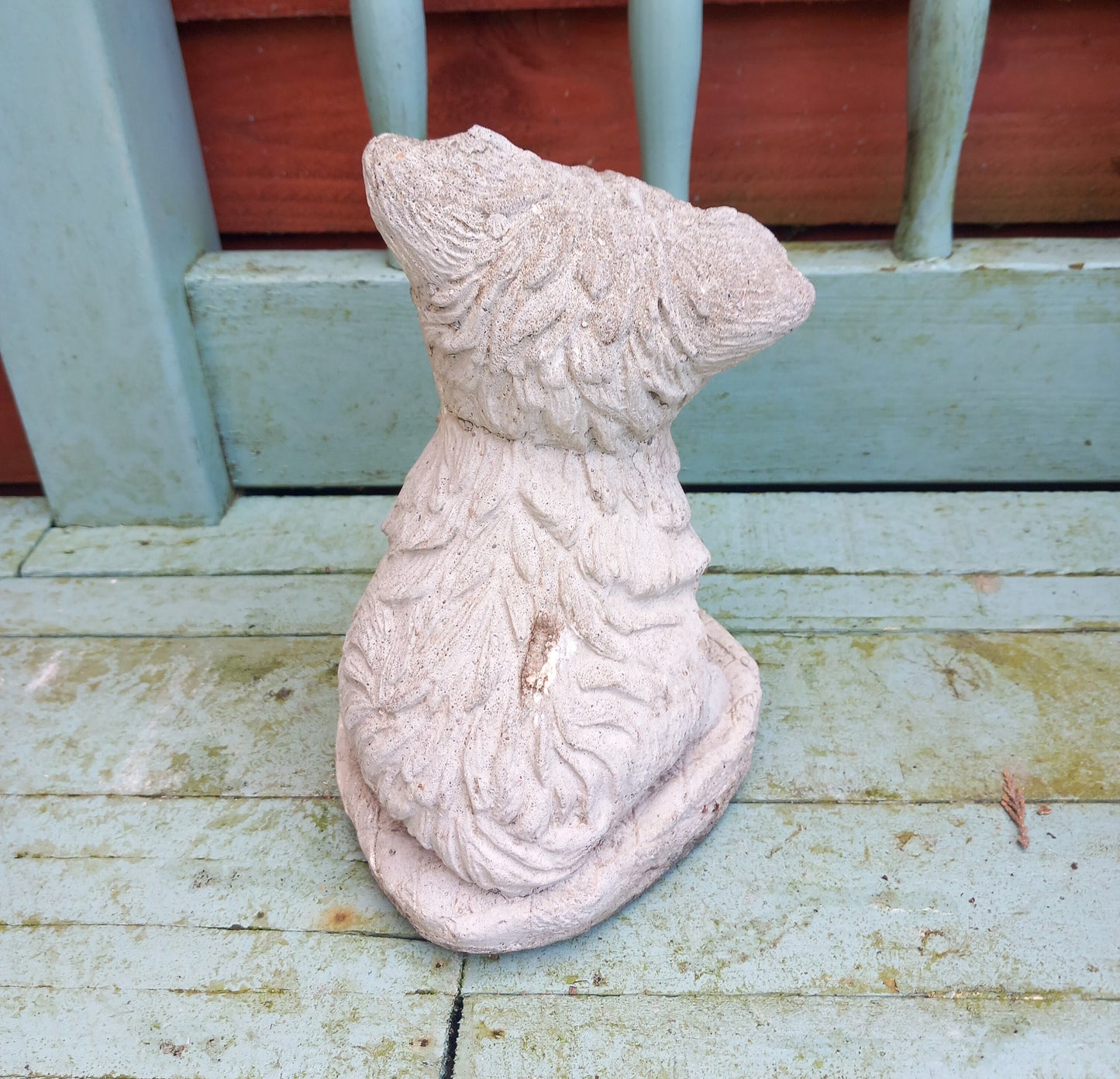 Vintage concrete garden statue of a terrier dog