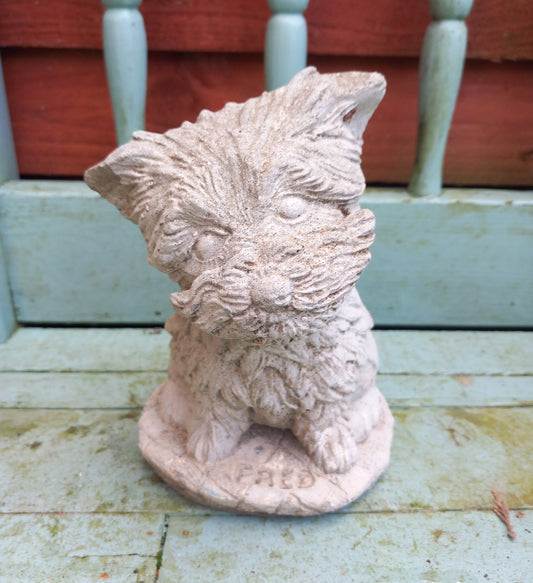 Vintage concrete garden statue of a terrier dog