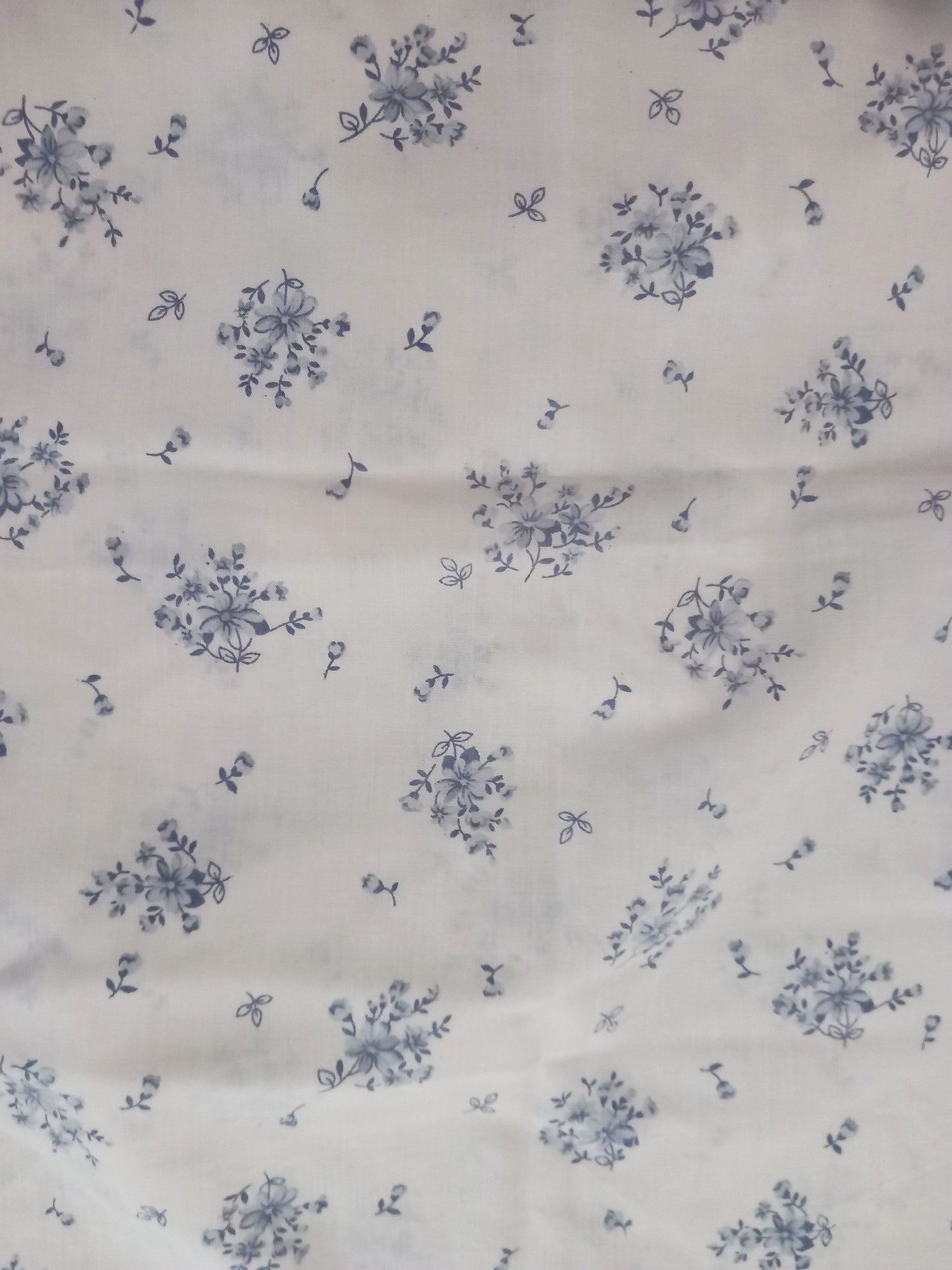 Four 1980s pillowcases in pink and blue with floral prints