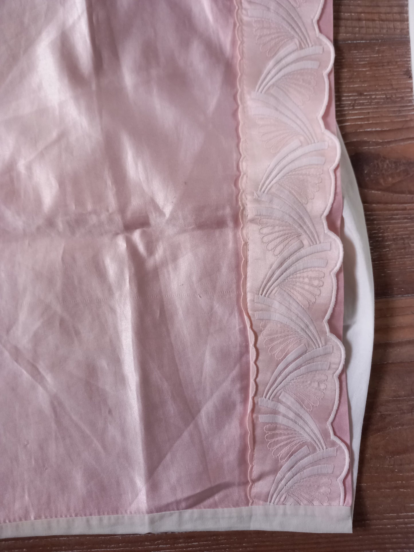 Four 1980s pillowcases in pink and blue with floral prints