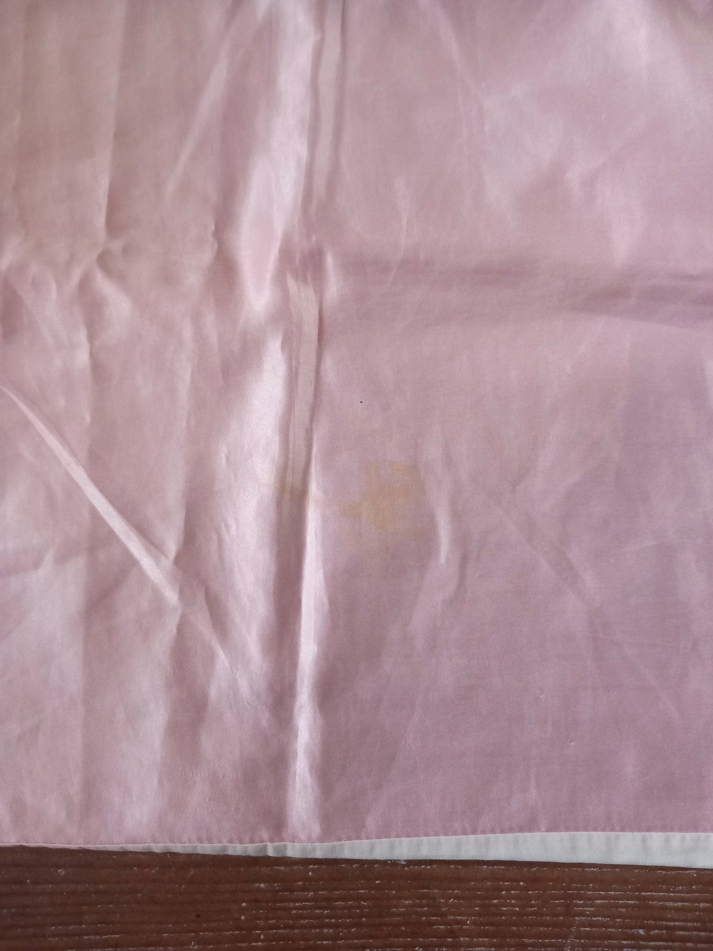 Four 1980s pillowcases in pink and blue with floral prints