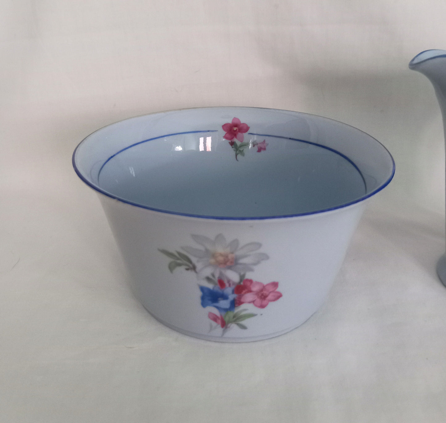 Art Deco blue cream jug and sugar bowl set with flower pattern