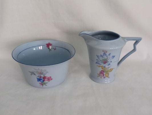 Art Deco blue cream jug and sugar bowl set with flower pattern
