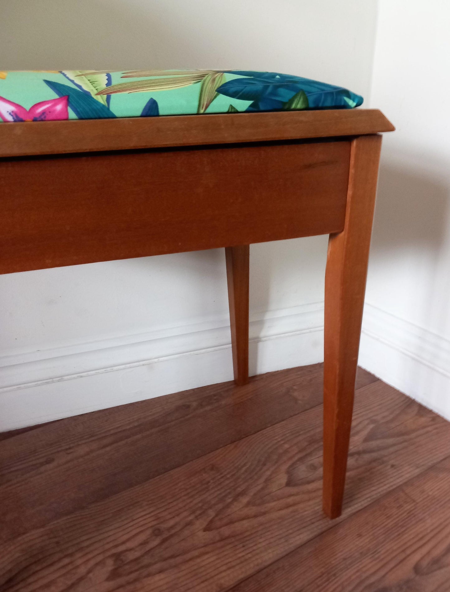 Mid century storage stool reupholstered in blue & pink tropical flower print fabric