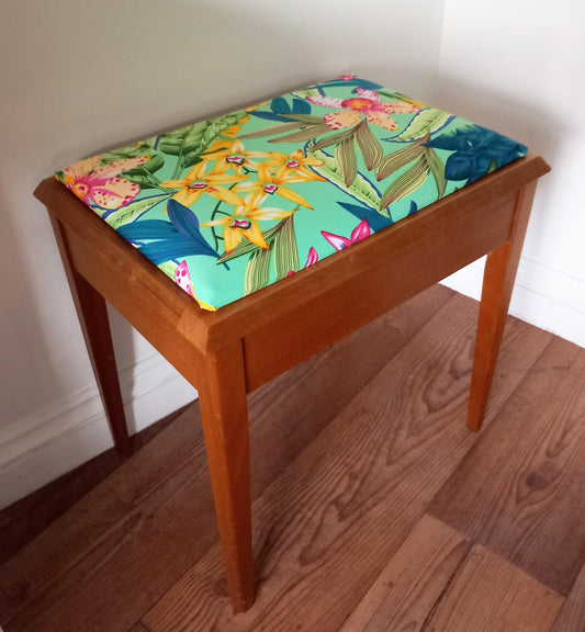 Mid century storage stool reupholstered in blue & pink tropical flower print fabric