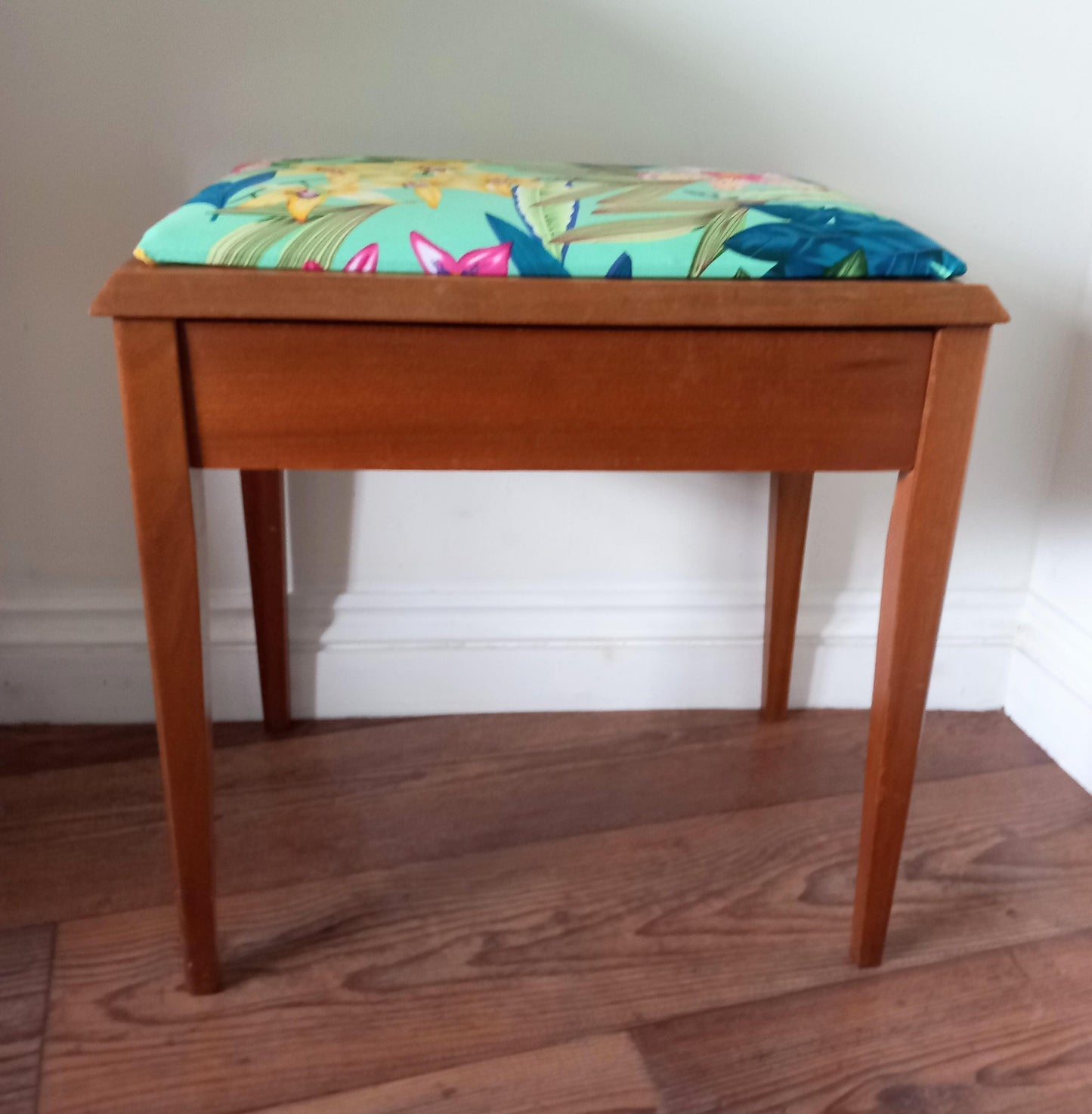 Mid century storage stool reupholstered in blue & pink tropical flower print fabric