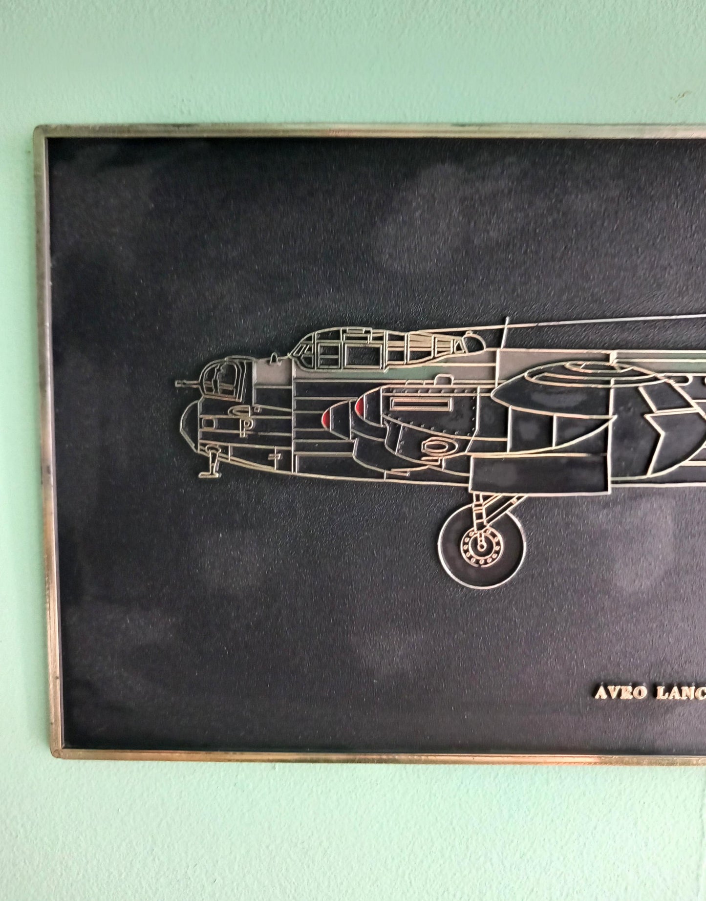 Mid century Lancaster aeroplane wall plaque in black and gold