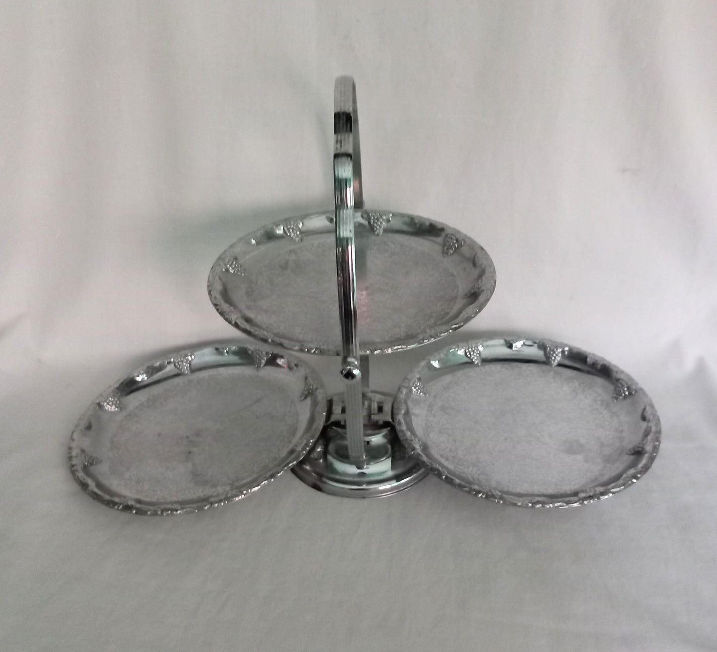 Vintage silver metal folding fruit stand with grape design