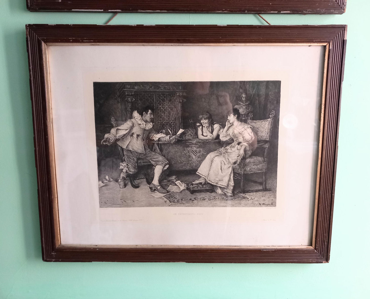 Pair of antique engravings in period wooden Frames