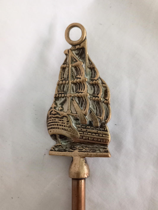 Vintage brass galleon ship design fire poker