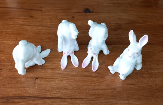 1980s set of 4 bone china white rabbits in different poses