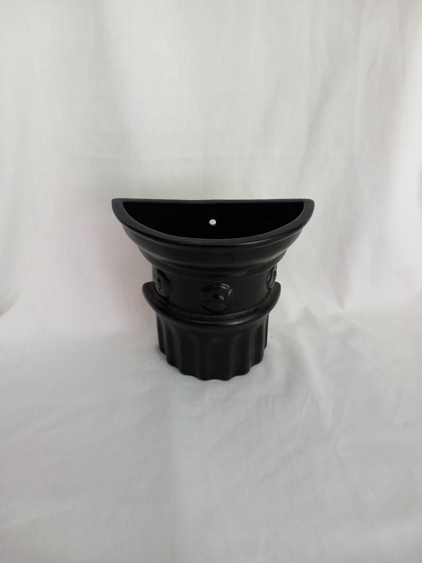 C1950s H Rigg black column design ceramic wall pocket