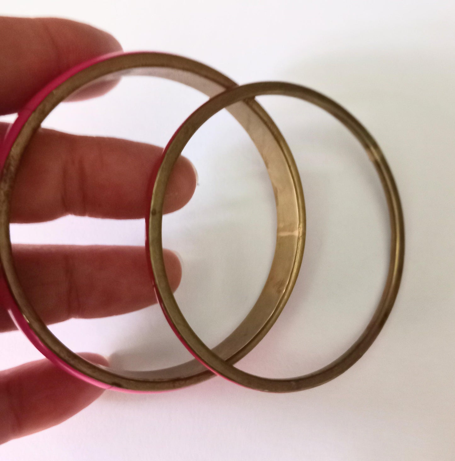 Vintage pair of brass and pink bangle bracelets