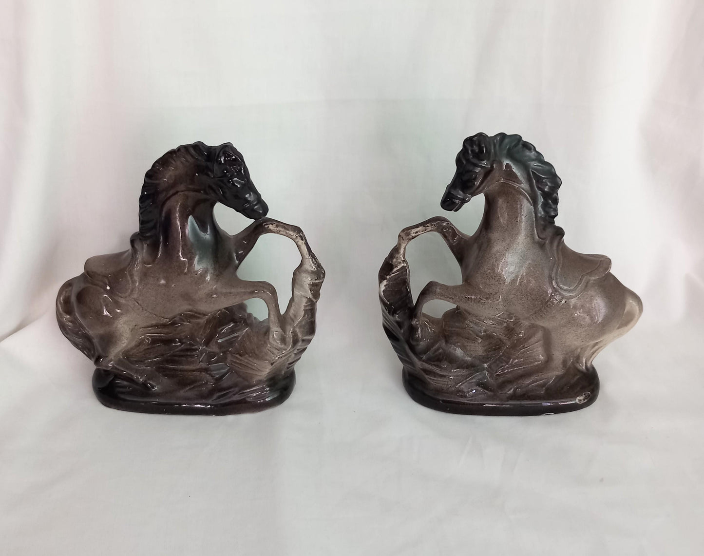 Mid Century pair of ceramic rearing horse statues