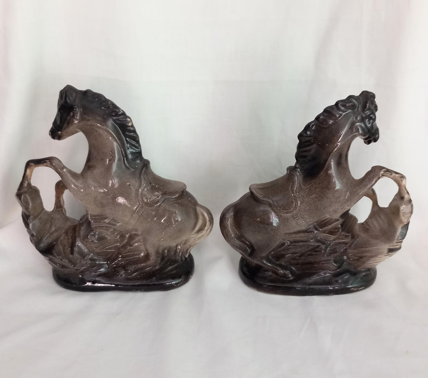 Mid Century pair of ceramic rearing horse statues