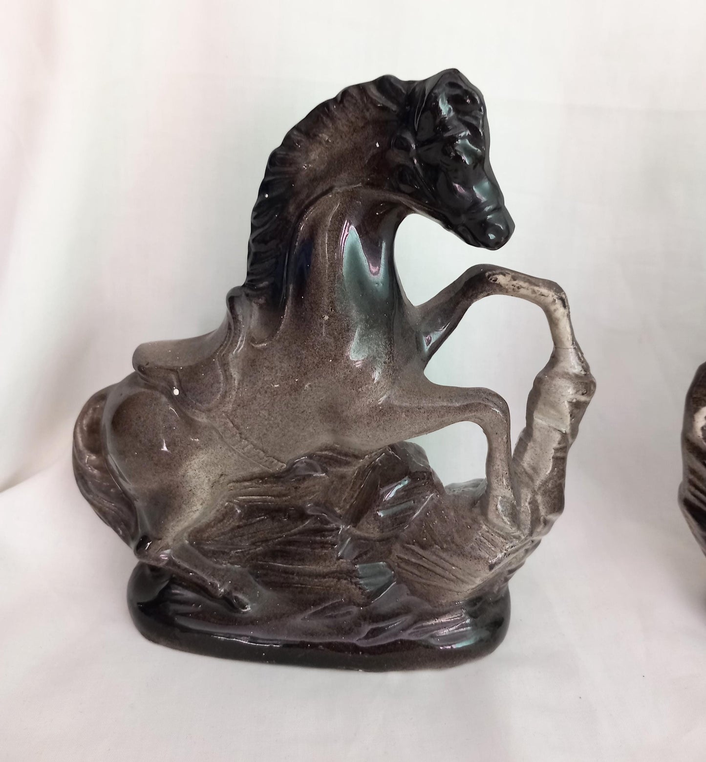 Mid Century pair of ceramic rearing horse statues