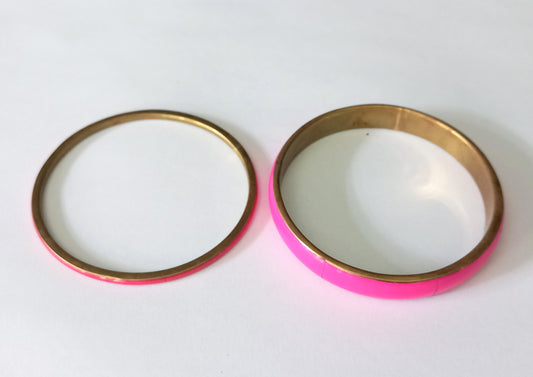 Vintage pair of brass and pink bangle bracelets