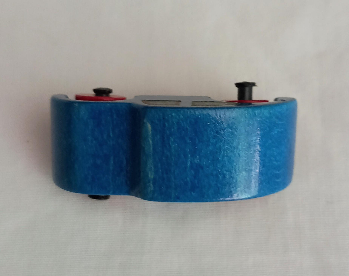 1960s hand made blue & red wooden car brooch with moving wheels