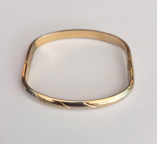 1980s goldtone chevron design hinged bangle bracelet