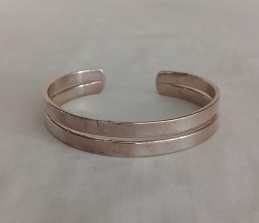 Unmarked silver double strand cuff bracelet