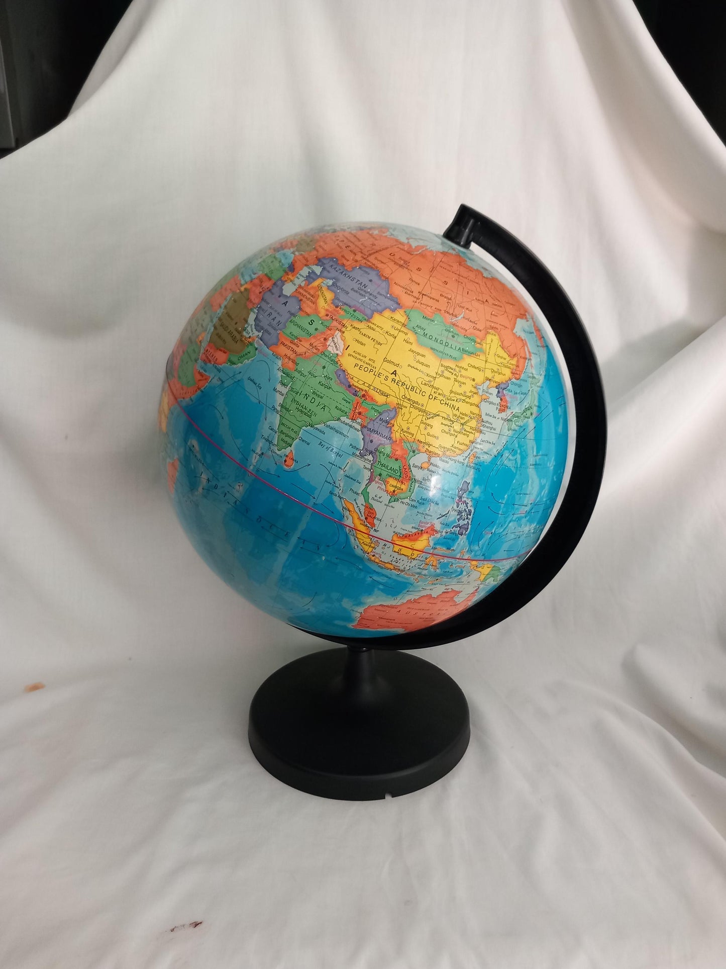 Large colourful world globe on black base 17.75"