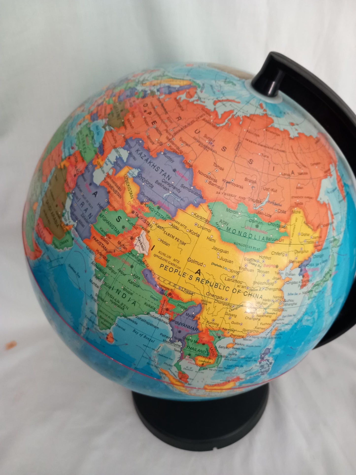 Large colourful world globe on black base 17.75"