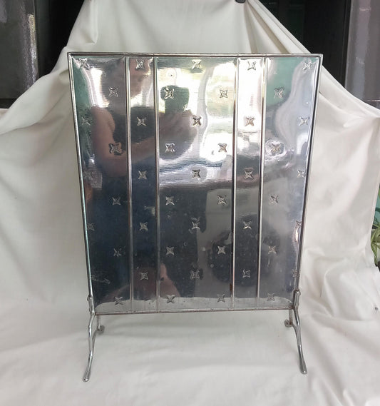 Vintage art deco style chrome plated firescreen with star pattern