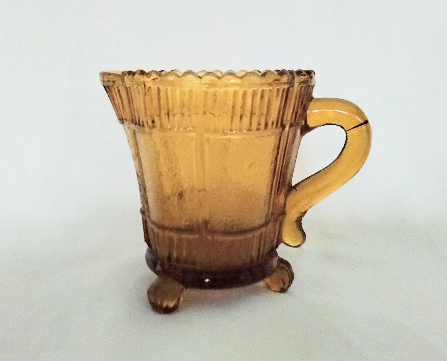 Victorian amber pressed glass creamer jug