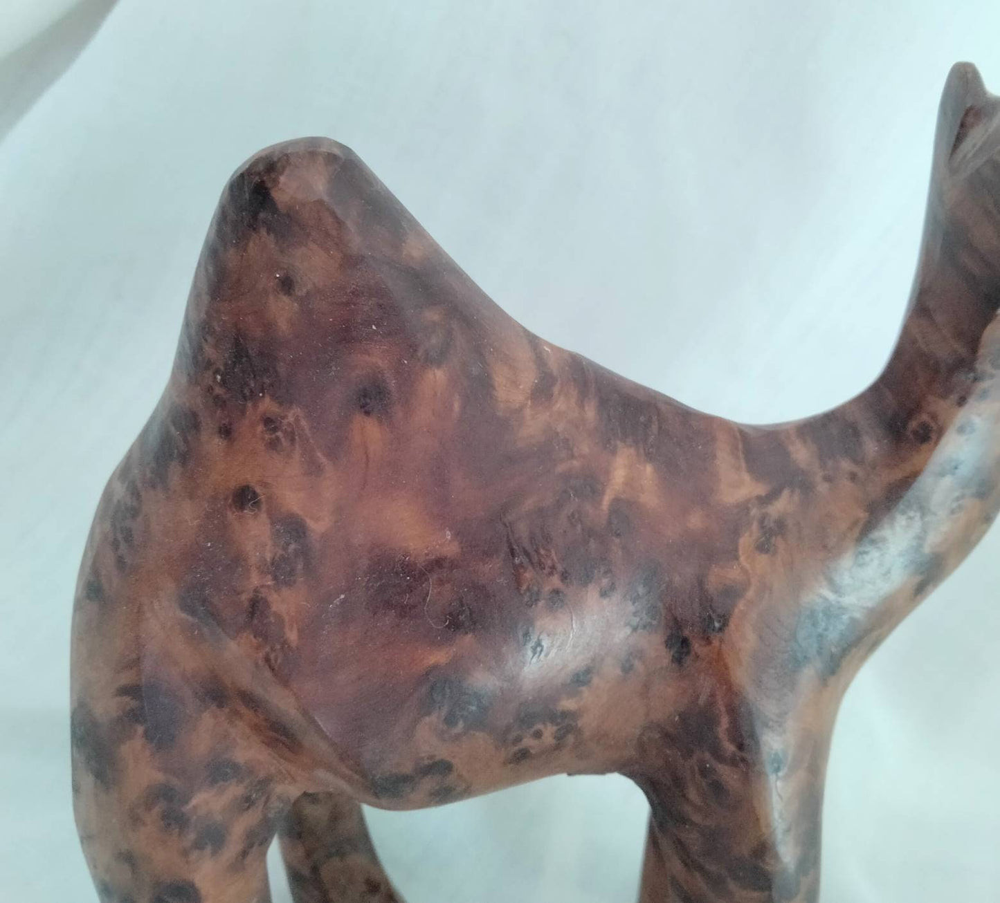 Ethnic hand carved wooden camel statue with beautifully patterned grain